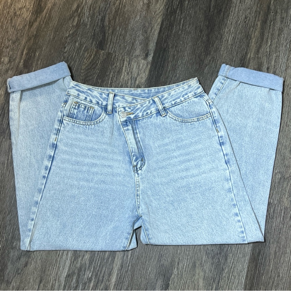 Classic Light Blue Boyfriend Jeans. Slanted button up.